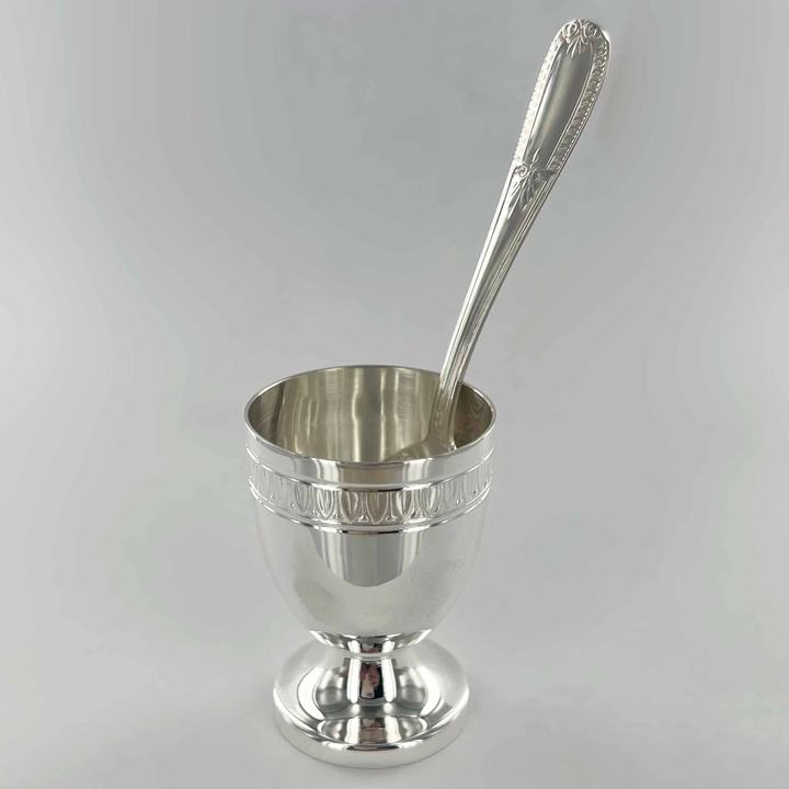 Empire egg cup and its egg spoon